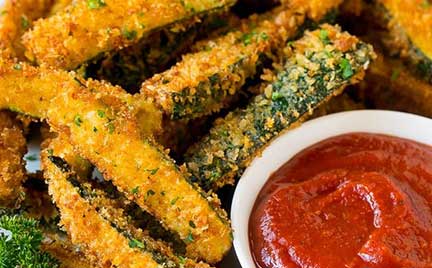 fried courgette with ketchup dipping sauce
