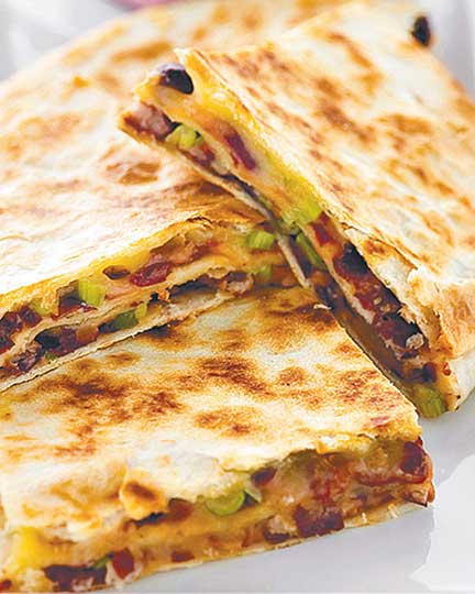 A close up of Quesadilla made with cheese