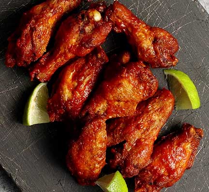 A close up of chicken wings